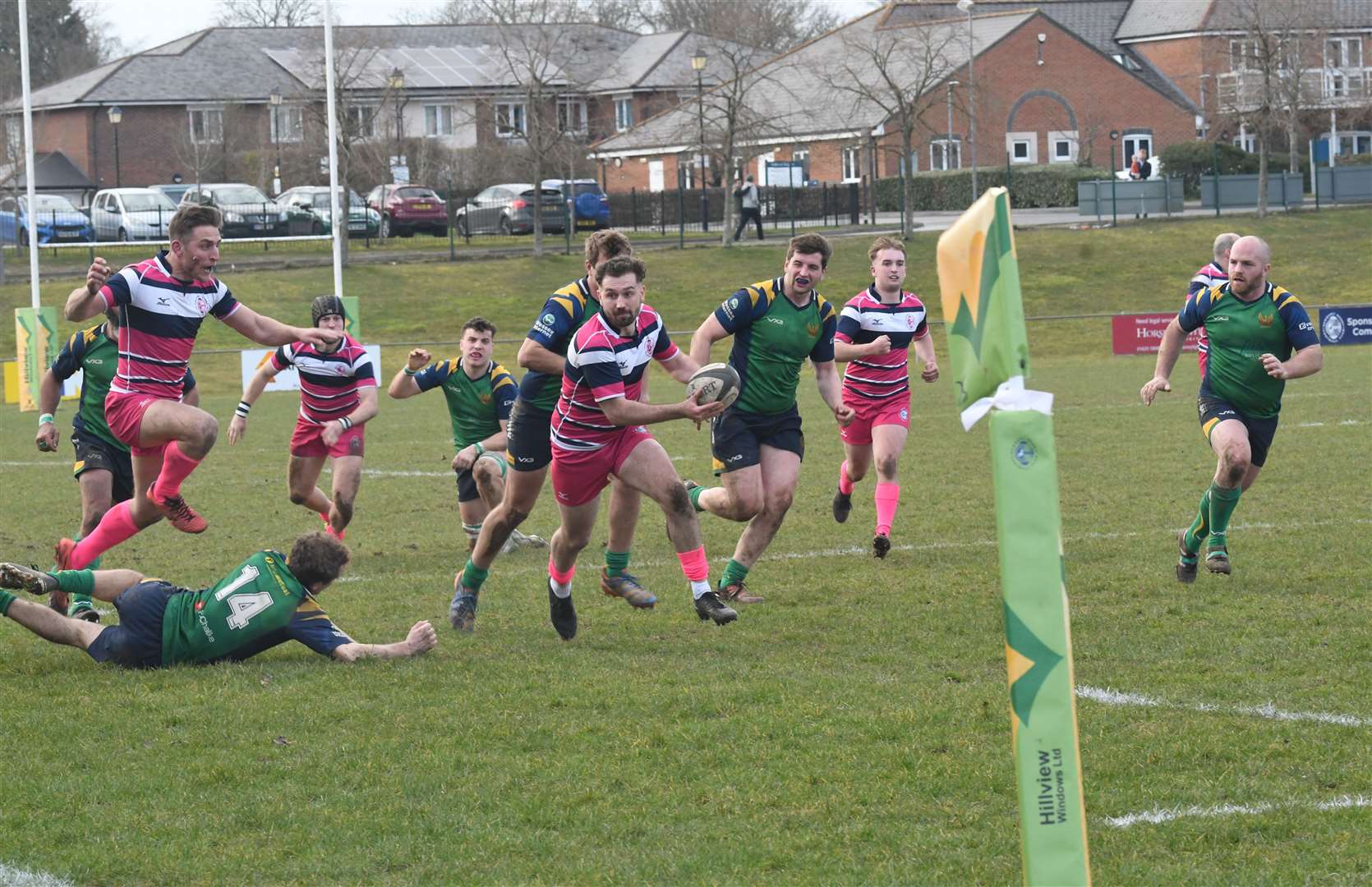 Newbury Blues' Jamie Futcher on the ball in their Pink Day win - Photo: Peter Branch