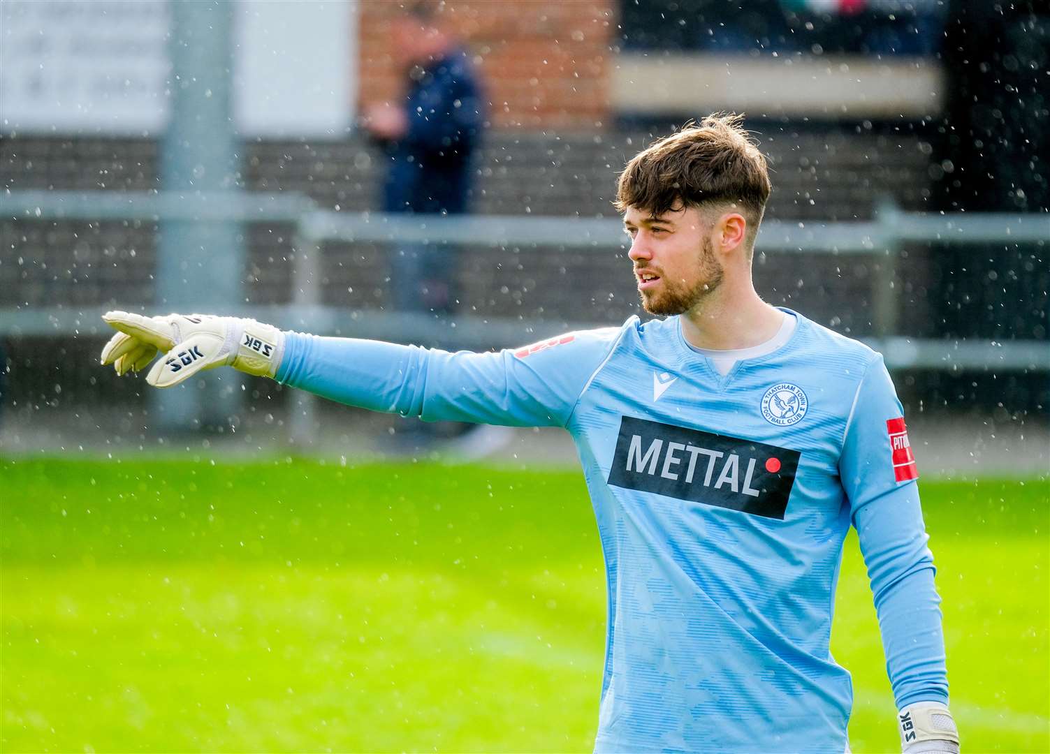 Goalkeeper Toby Fisher, who trains in the week with League Two side Sutton
