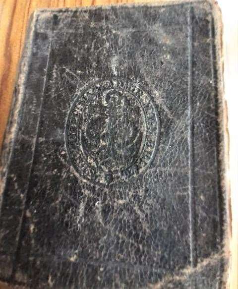 Prayers and Hymns book, published by William Clowes & Sons. The Seal of the Office of the Lord High Admiral of Great Britain is visible