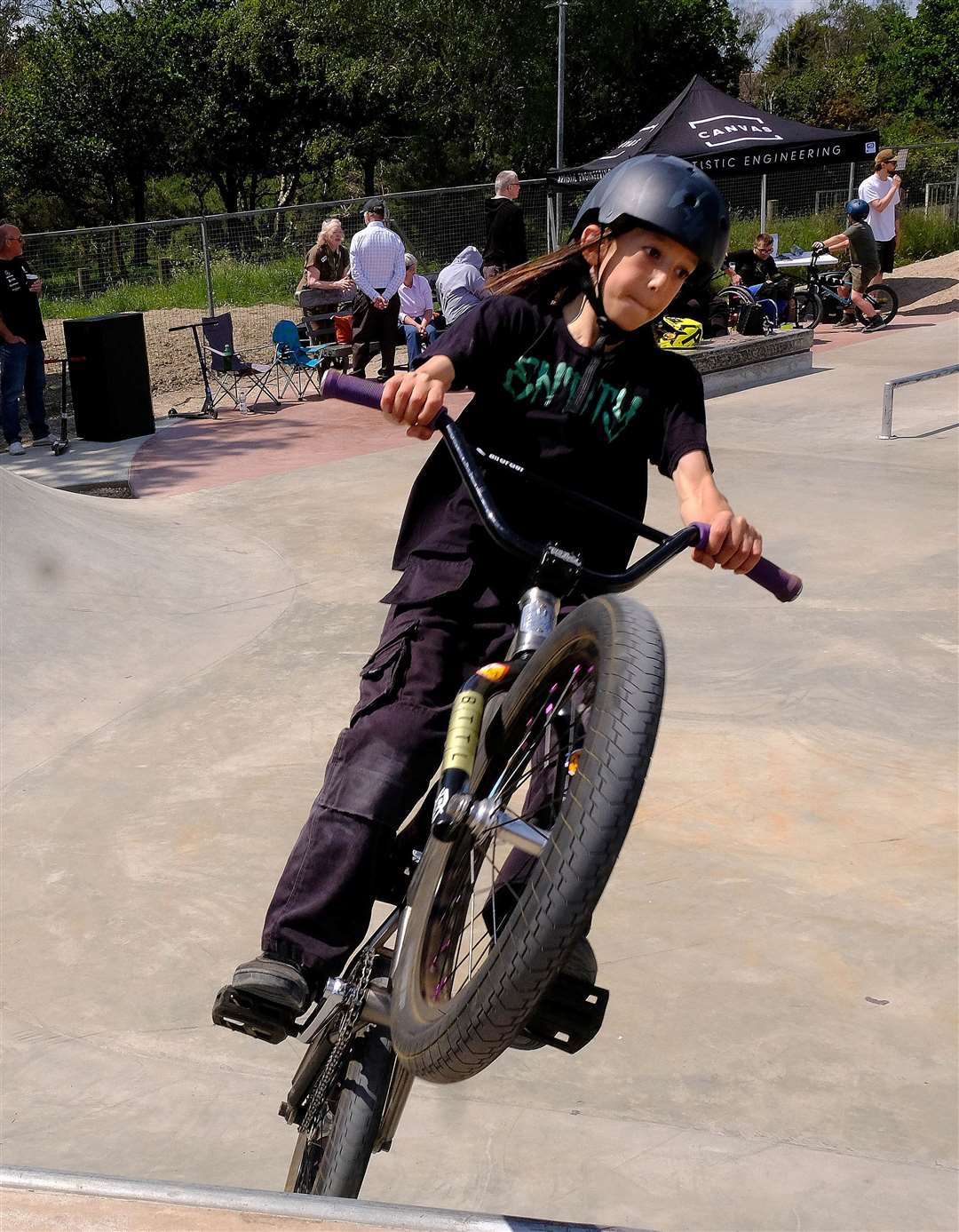 Steven Peach (11) on his BMX