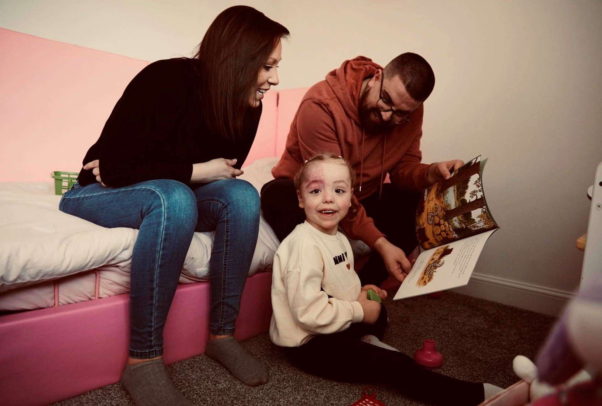 Nyla with mum Natalie and dad Michael, picture: Nyla's SWS Journey on Facebook