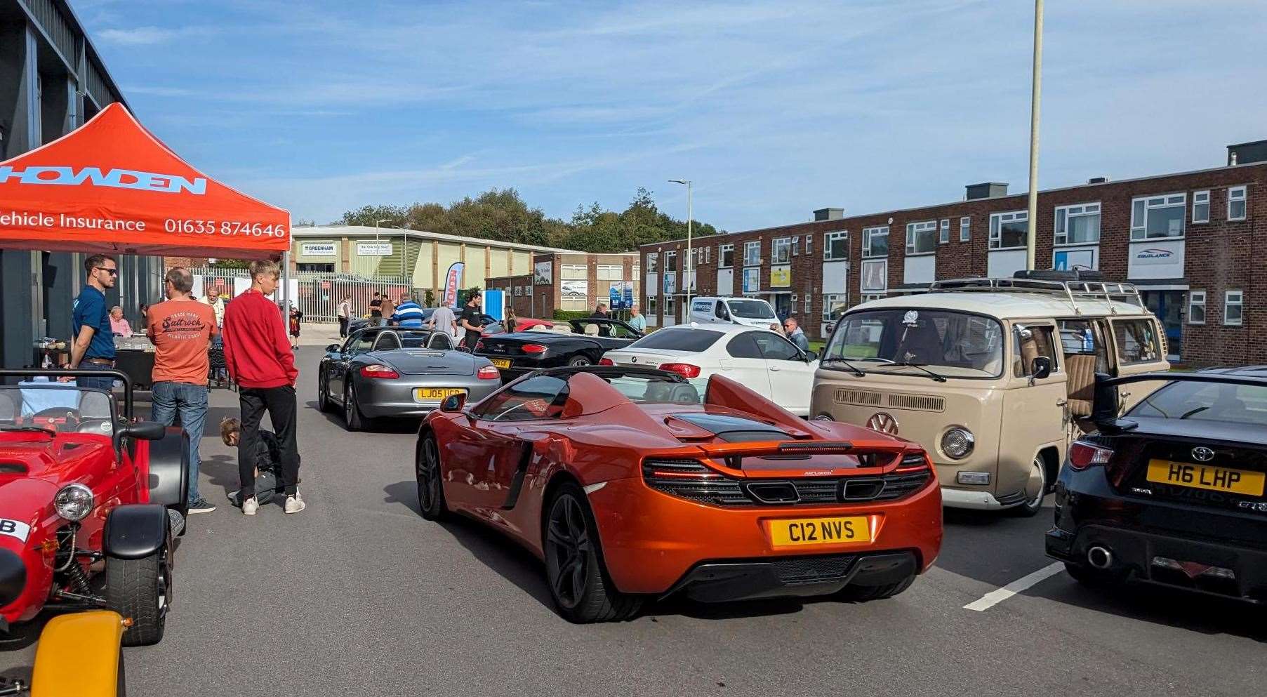 Mclaren driving past a Toyota GT86, VW Camper and BMW 3 series, picture: Howden