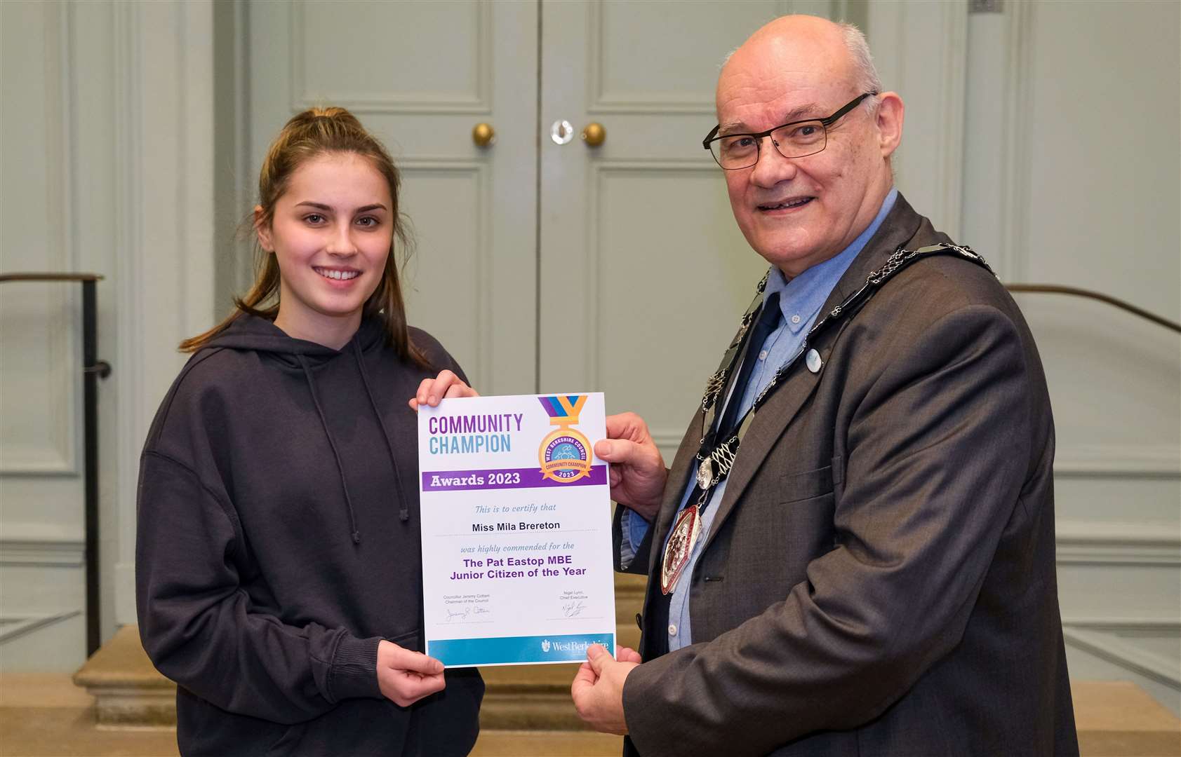 The Pat Eastop MBE Junior Citizen of the Year highly commended Milla Brereton with West Berkshire Council chairman Jeremy Cottam