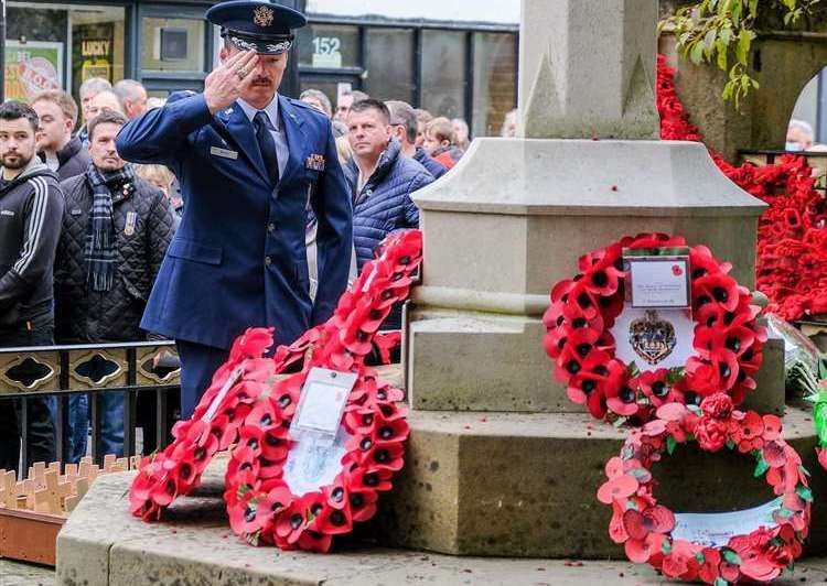 A soldier paying his respects at Newbury War Memorial in 2021