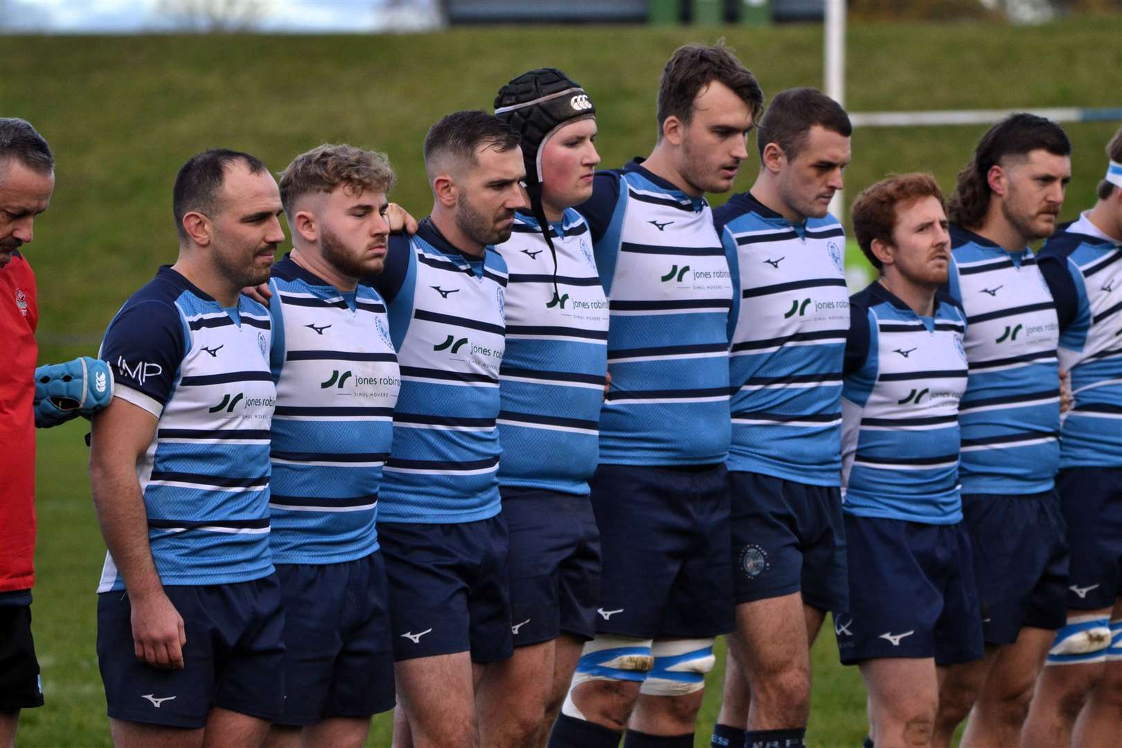 Players and officials observe a minute’s silence to mark Armistice Day. Pictures by Chris Forsey
