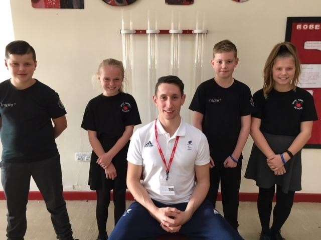 Broom-Edwards visits a school