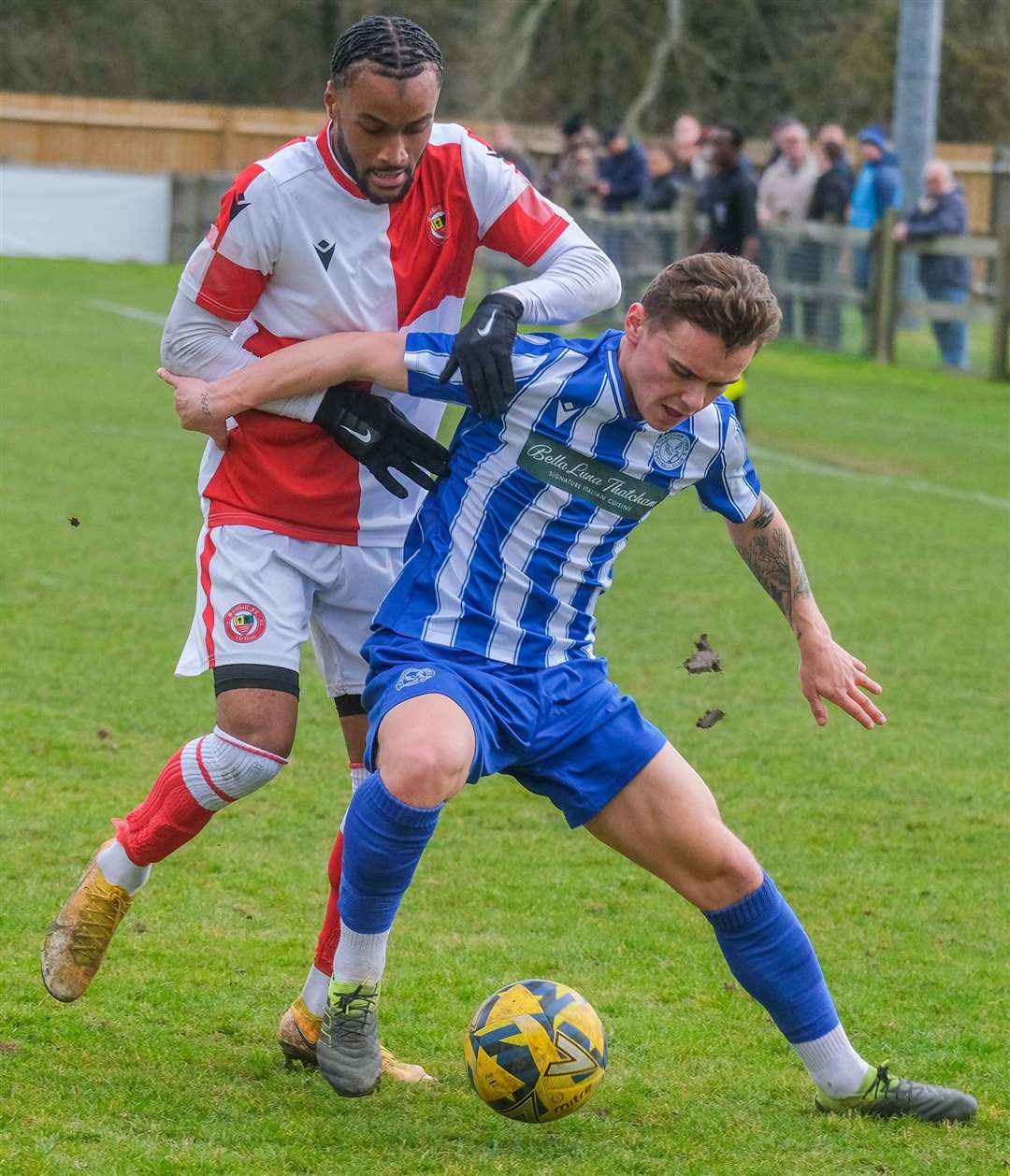 Full-back Alfie Saunders fends off pressure