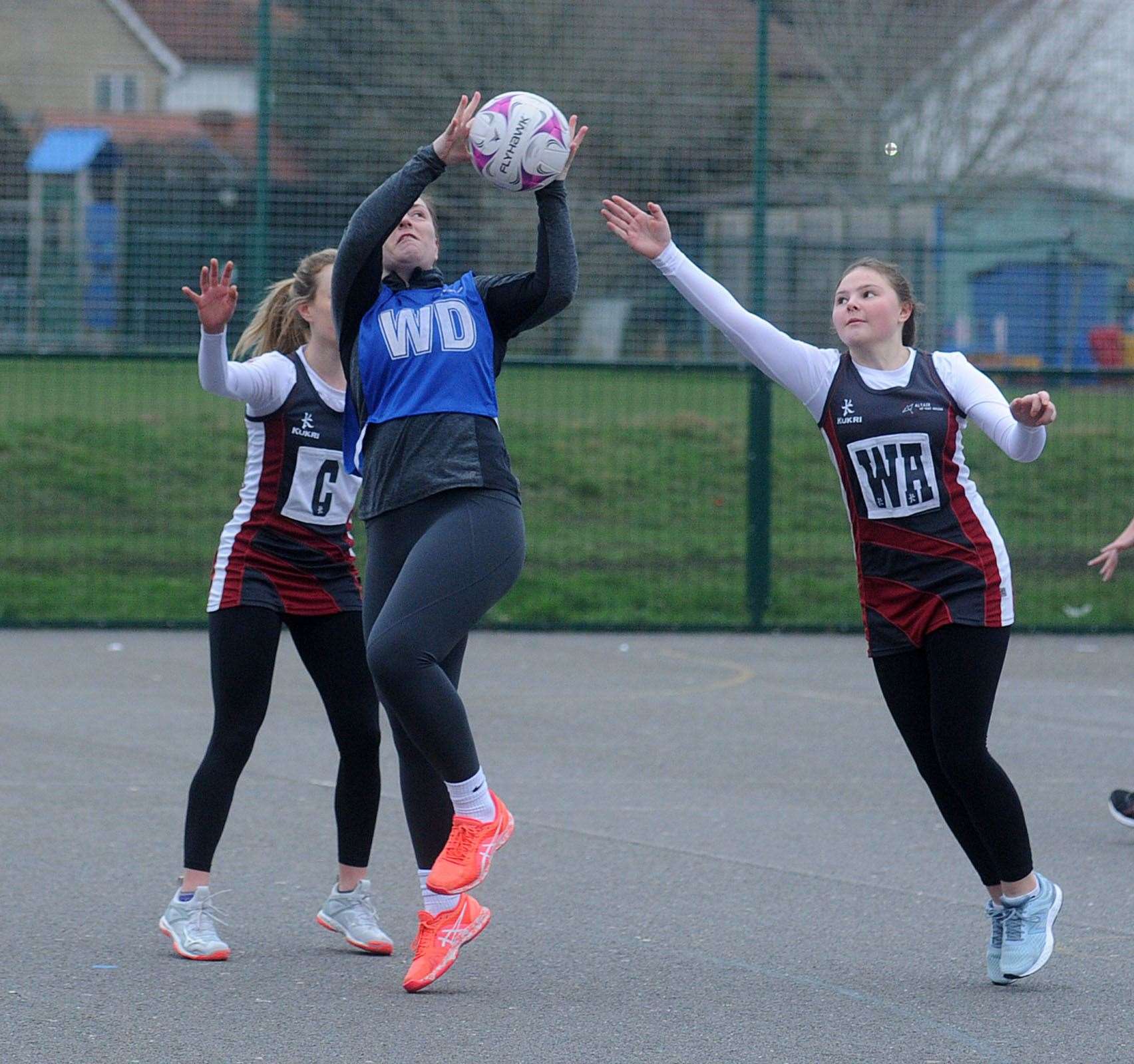 An Acorn player has the ball