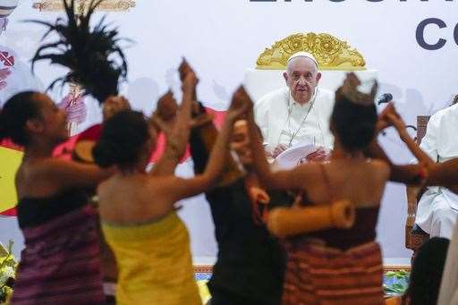 During a visit to East Timor, Francis was welcomed to Dili by young dancers (Gregorio Borgia/AP)