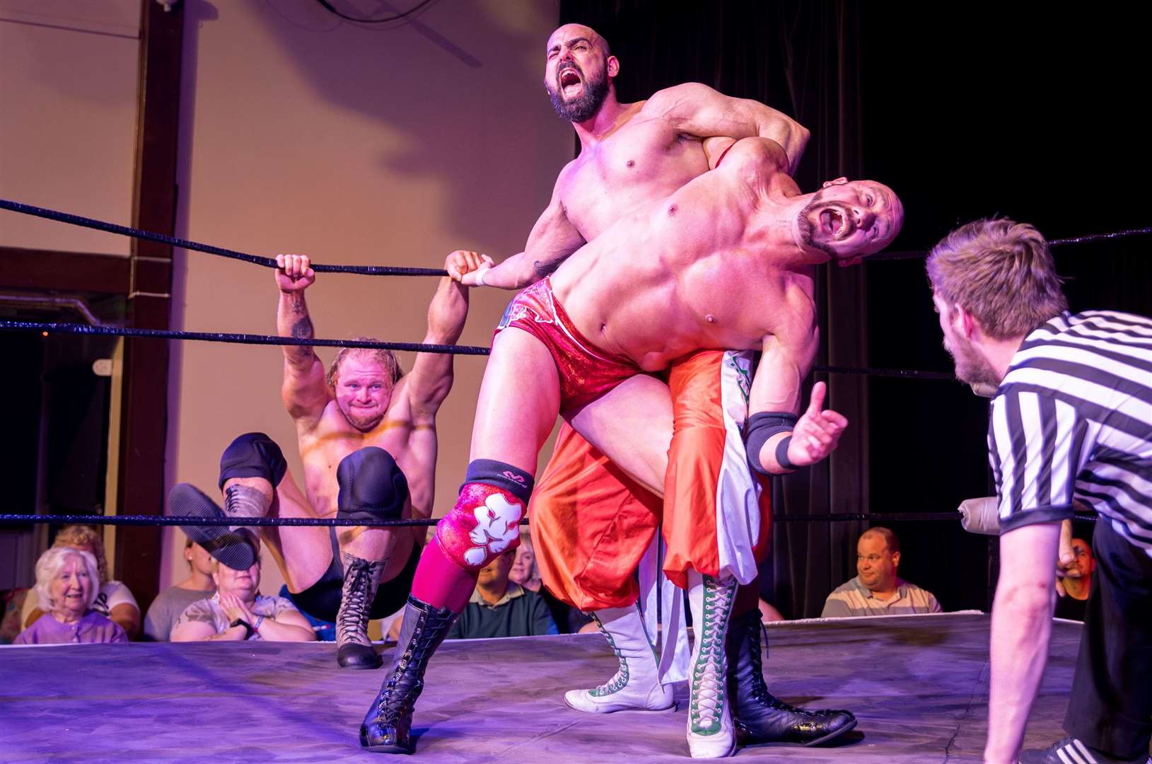 Chris Bronson (left) and Eddie Ryan (red trunks) at a British Kingdom Pro Wrestling event in Thatcham - Photo: Emma Meek