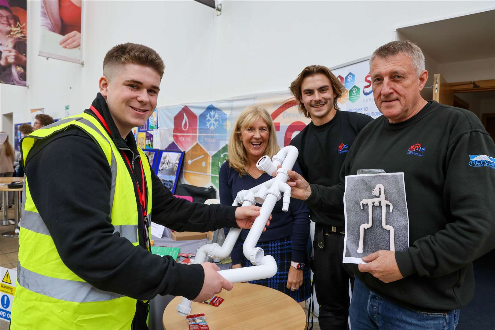Student visiting stand by SMS Commercial