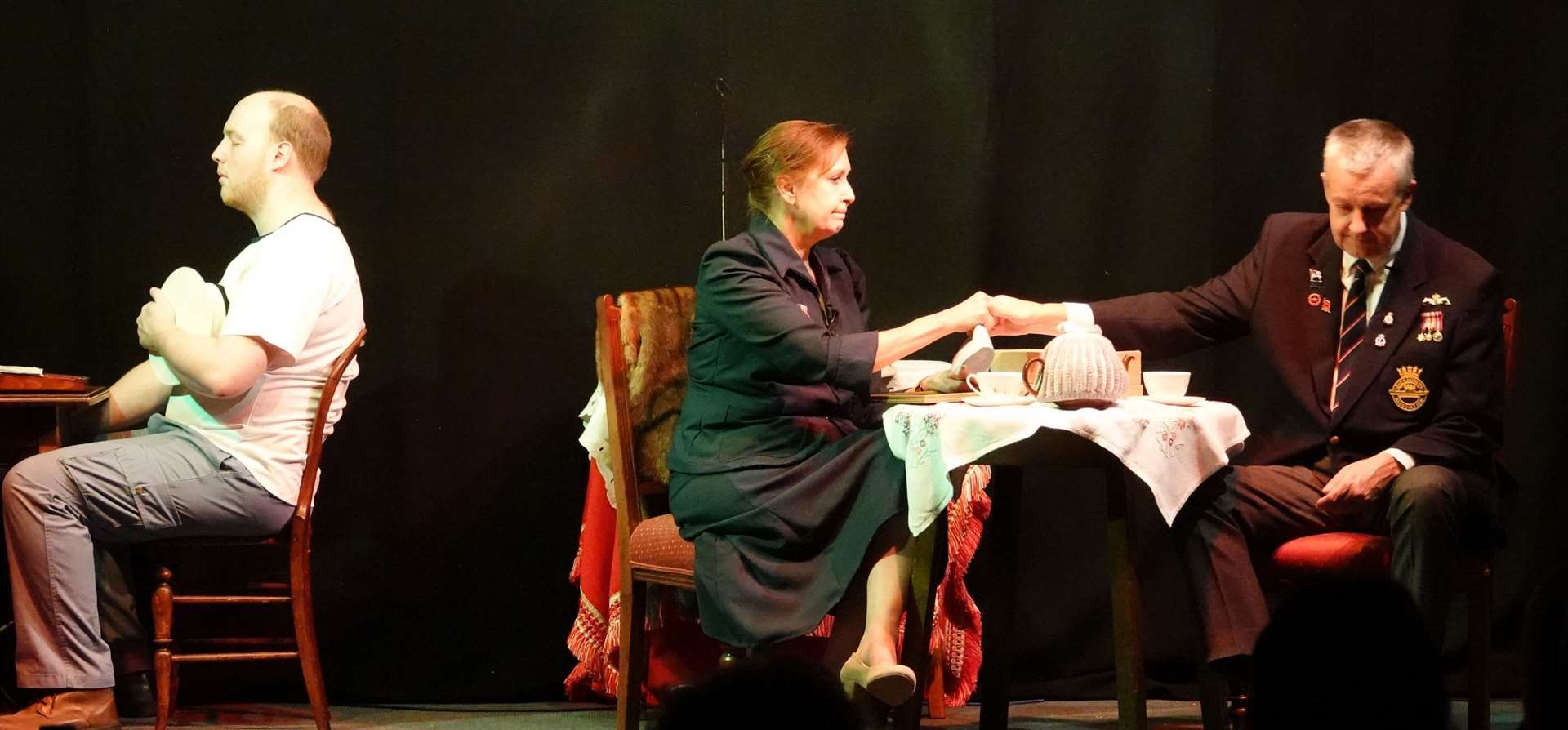 Sinking by Brian Sylvester, Lydia Humphries played by Judith Bunting, reminisces with Syd Part played by Steve Schollar, over the life and sad death of her drowned submariner son Jack Marshall Evans played by Andrew Smith. Jack died with all hands in 1940 when the submarine HMS Triad was sunk