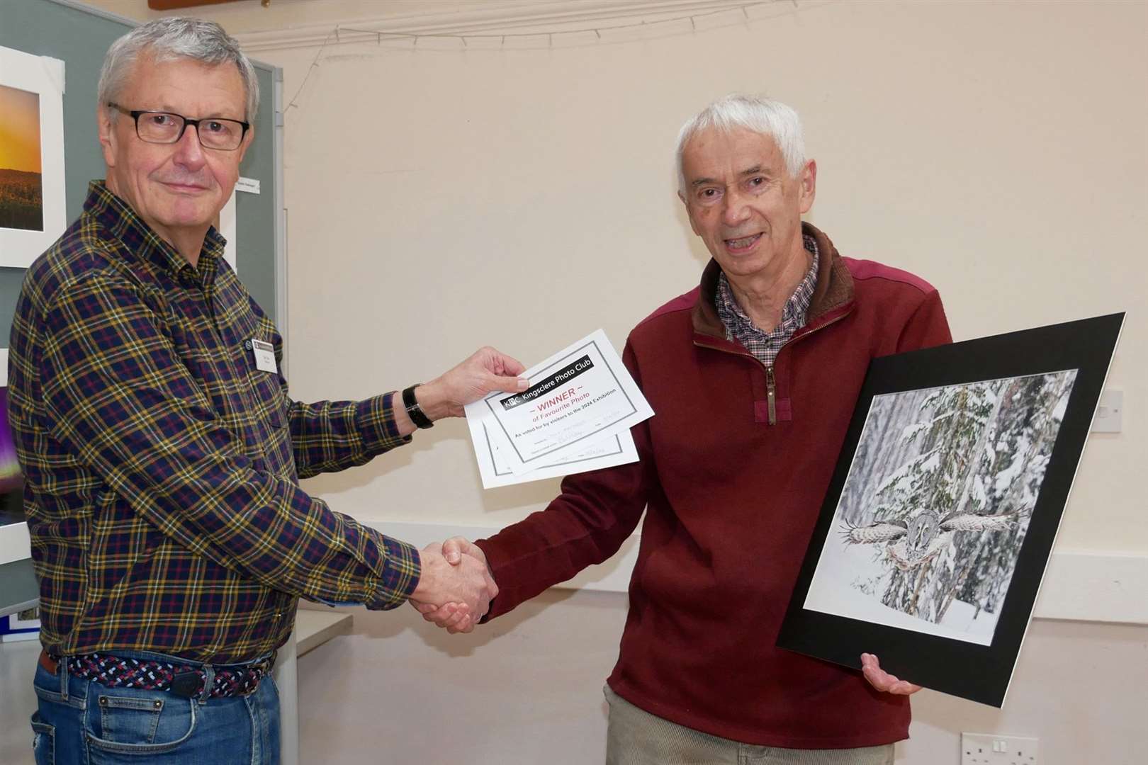 Tony Matthews (right) accepting his award from club chairman Bob Day