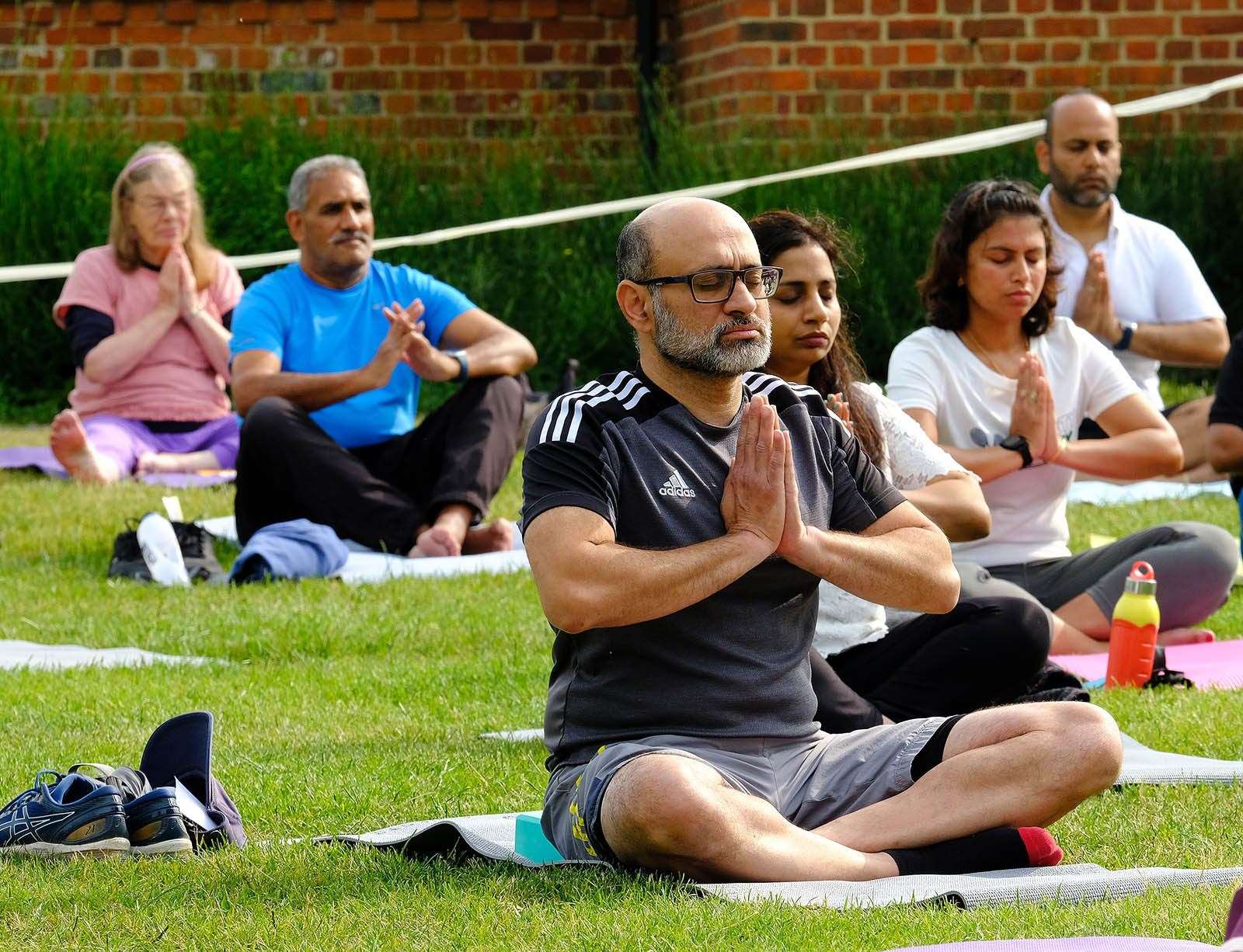 Residents take part in yoga day
