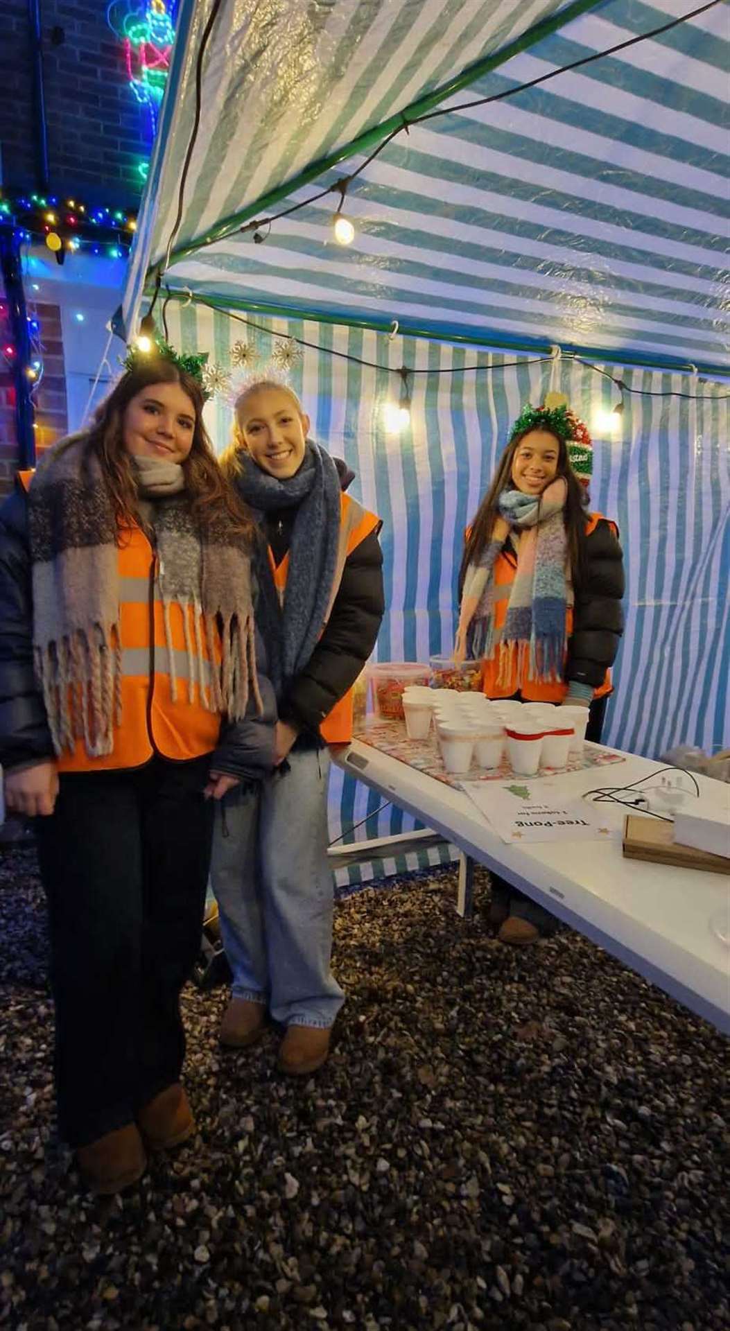 Young people volunteering at the Woolton Hill Christmas Festival in Harwood Rise