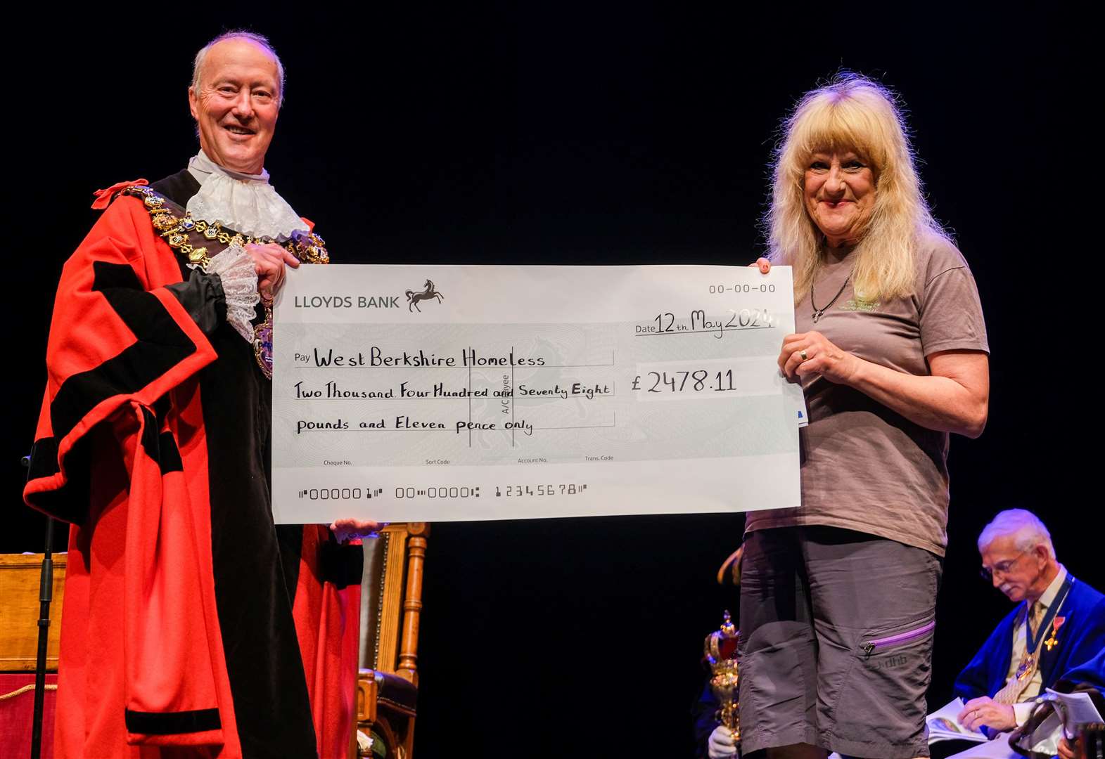 Outgoing mayor Nigel Foot presents cheque to West Berkshire Homeless