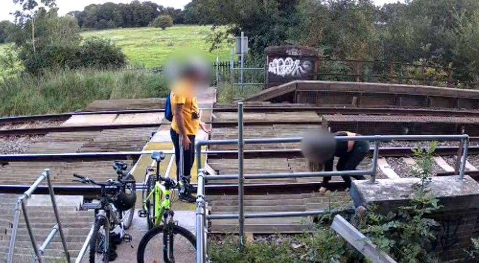 Dangerous behaviour captured on CCTV at Calcot Mill level crossing. Credit: Network Rail