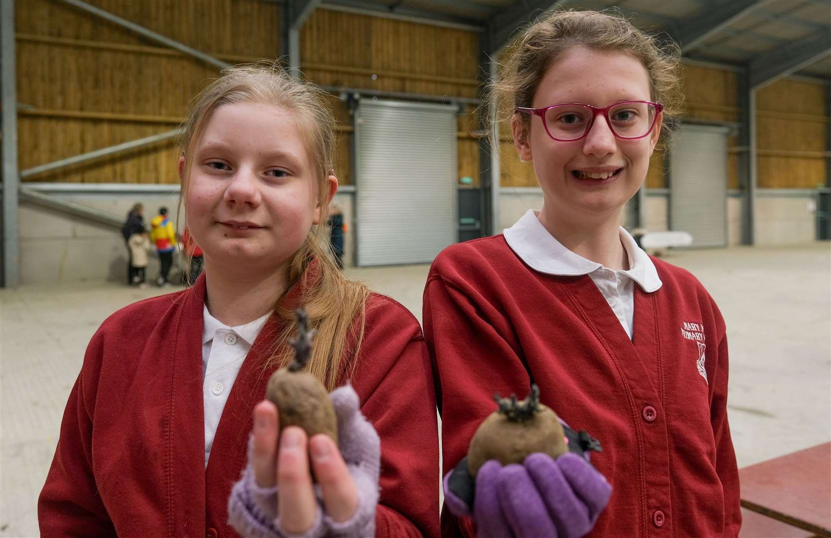 Mary Hare school pupils preparing to plant their potatoes