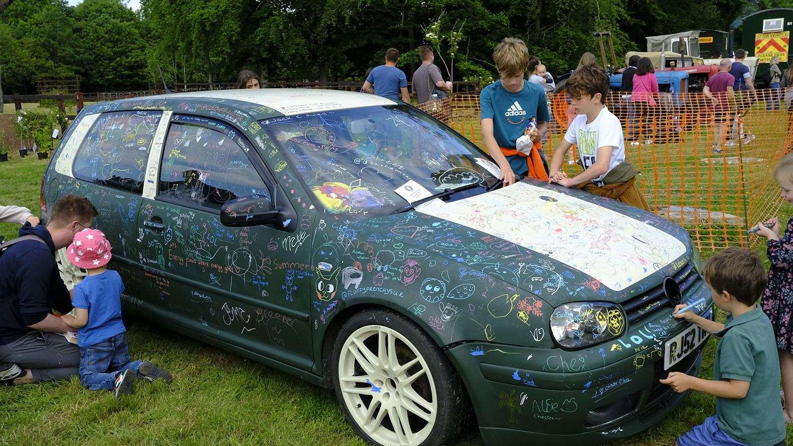 Car owned by Yattendon Garage (01635 202702) will be clear coated and left like this with all the decoration made by villagers at the fete