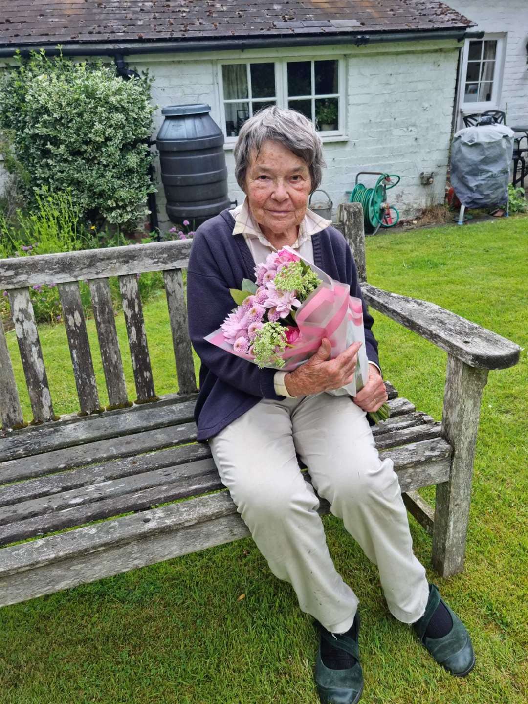 Mrs C was given a bouquet of flowers