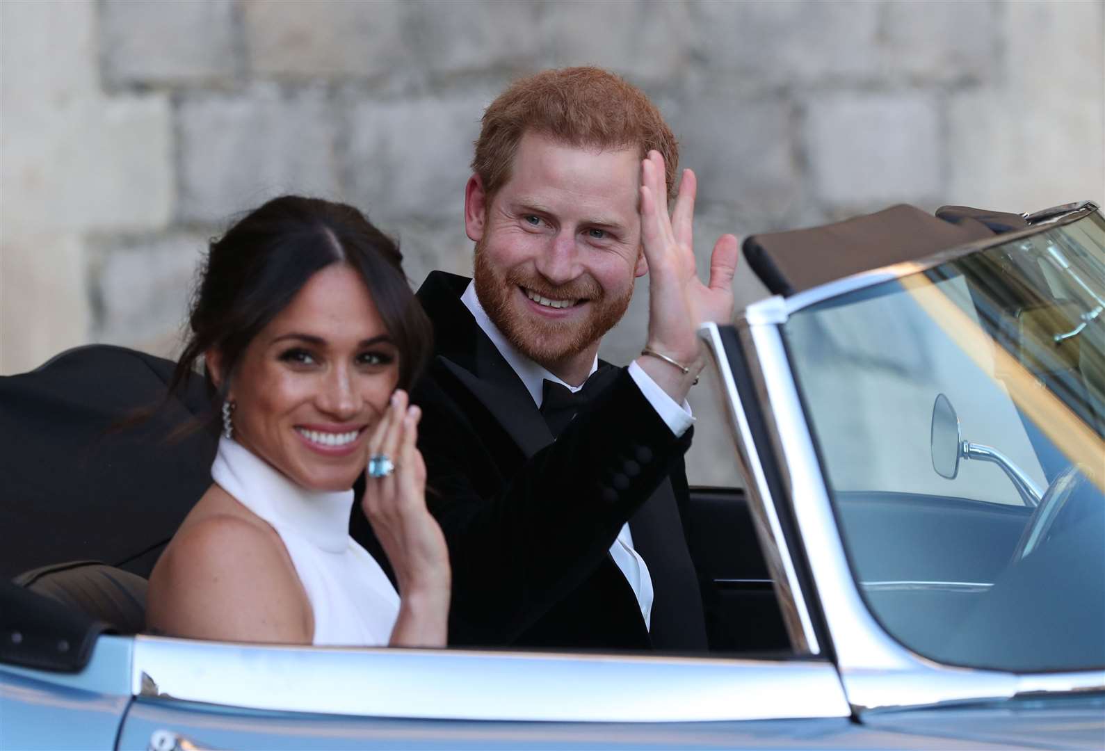 Prince Harry used the Audi for a year prior to his marriage to Meghan Markle, pictured here at their wedding in 2018. Photo credit: Steve Parsons/PA Wire.