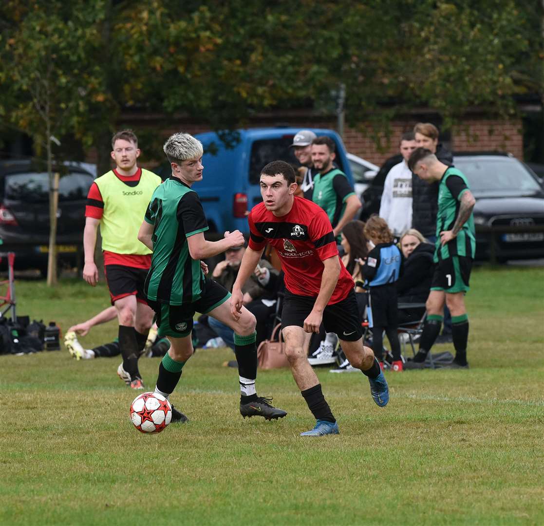 An NWX player brings the ball forward