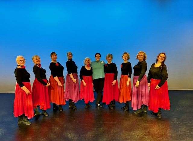 The performing Silver Swans and their teacher, Sonia, after their tech rehearsal