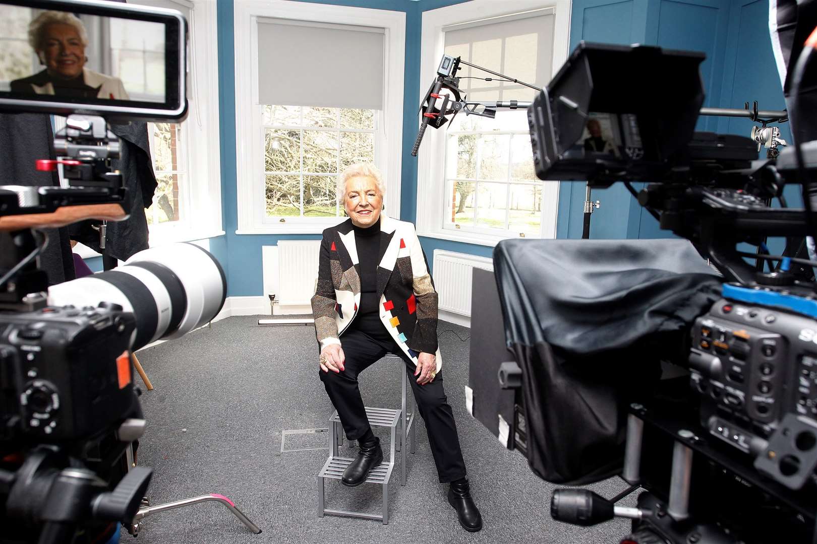 Dame Stephanie in front of the camera. Credit: Prior's Court