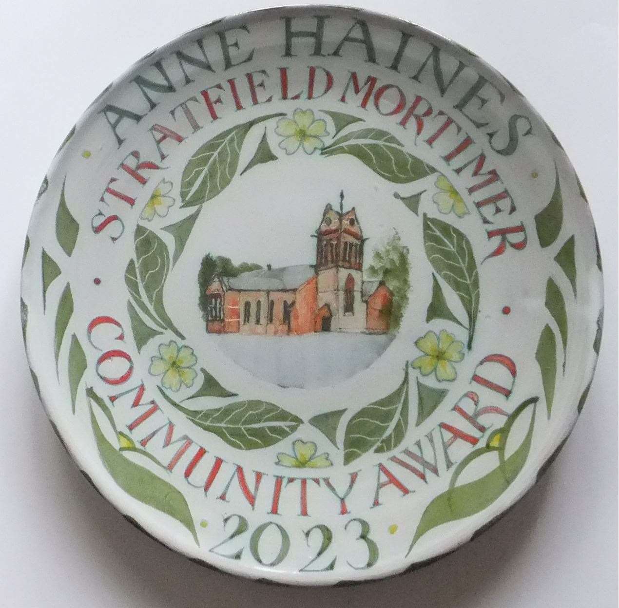 Anne Haines’ plate reflected her passion for flowers and the church. Credit: Nick Carter