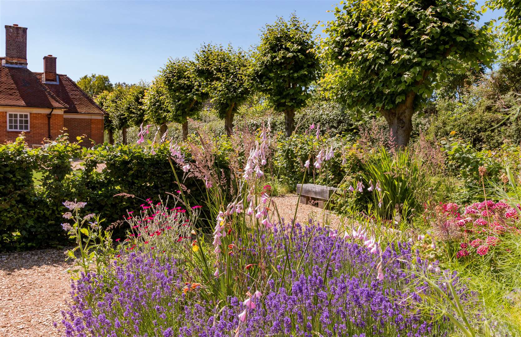 The gardens in summer at Sandham Memorial Chapel, National Trust Image Hugh Mothersole