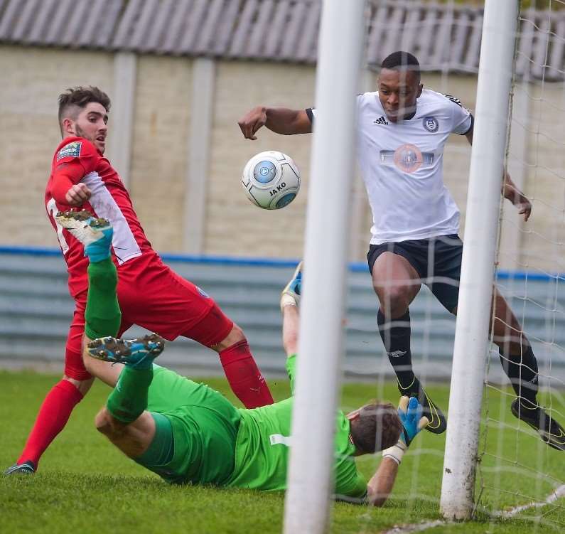 Almost: Allan Julian keeps out Jamal Lawrence's last-gasp effort