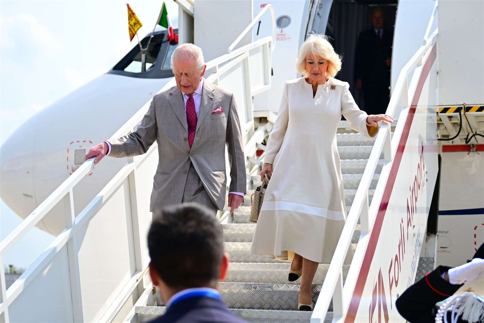 Charles and Camilla arrive at Forli Airport, on the last day of the four-day state visit to Italy (Victoria Jones/PA)
