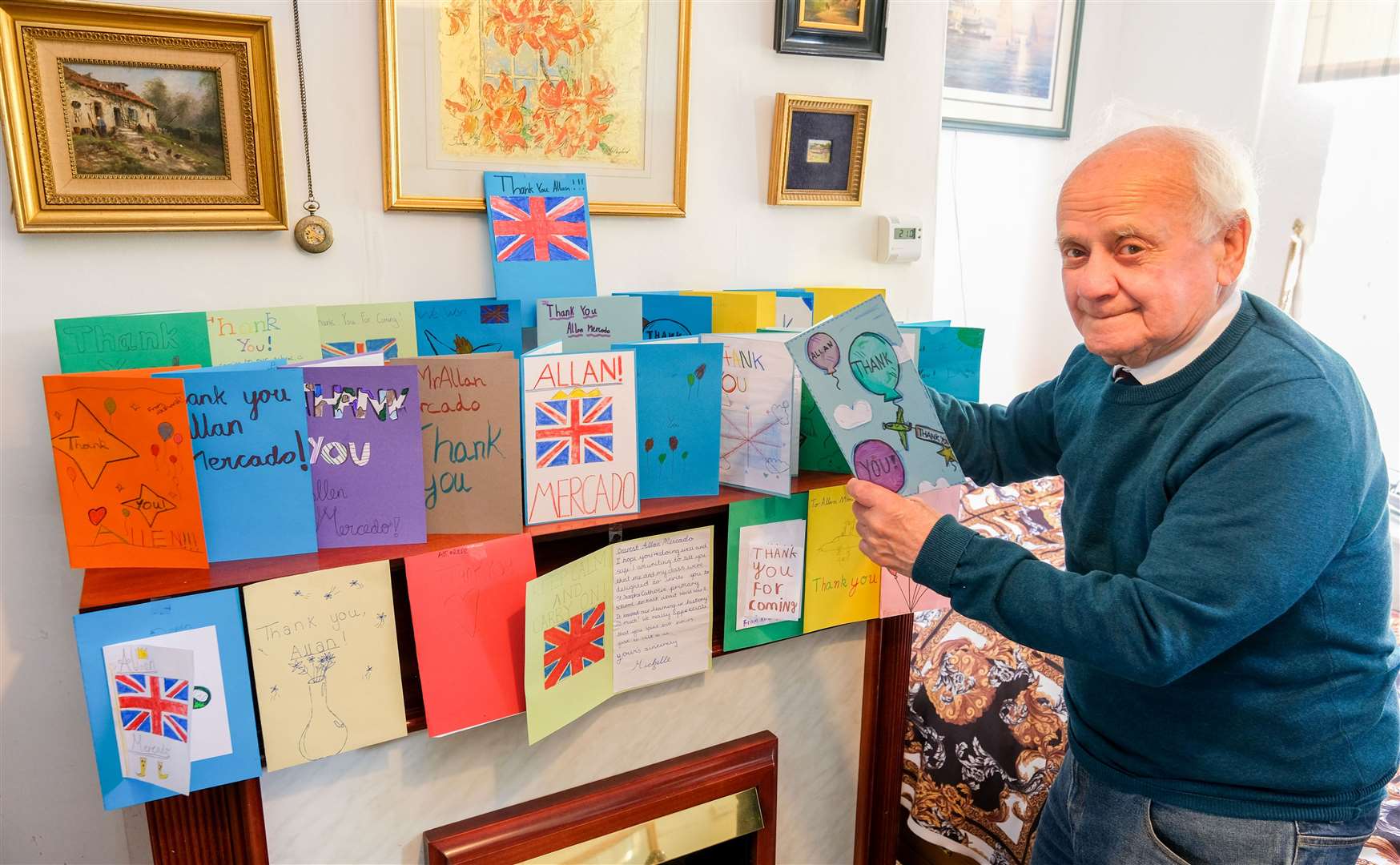 Allan Mercado with the ‘thank you’ cards he received from pupils at St Joseph's Catholic Primary School
