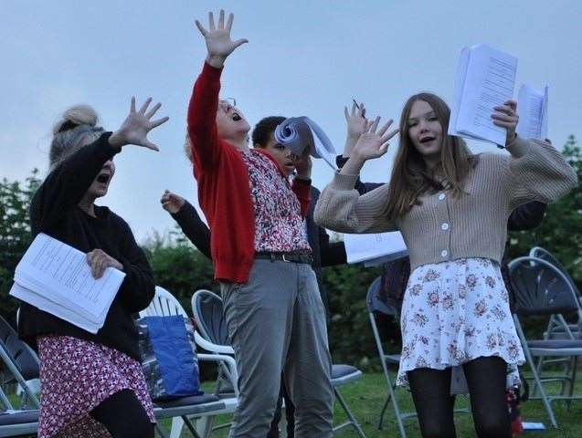 Lizzie Lewis (as Delphi) casts her spell on Bellerophon (Dylan Morris)
