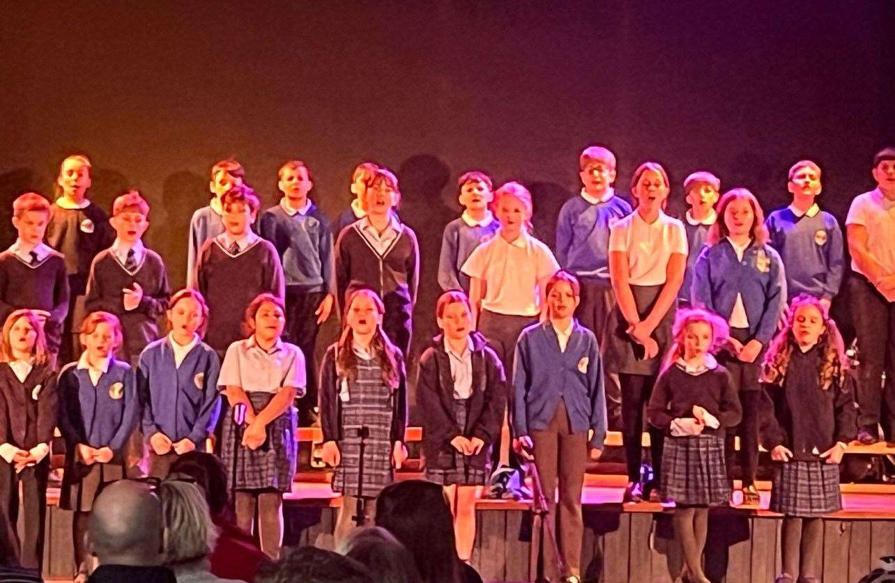 Pupils from the three primary schools sung in a grand finale before an audience of their parents. Image supplied by The Downs School