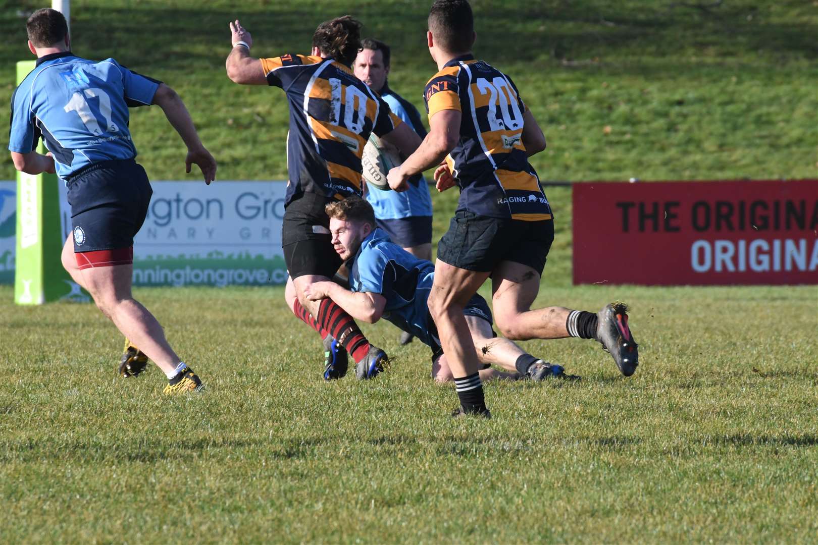 Tough tackling in the Boxing Day match. Pic: Peter Branch
