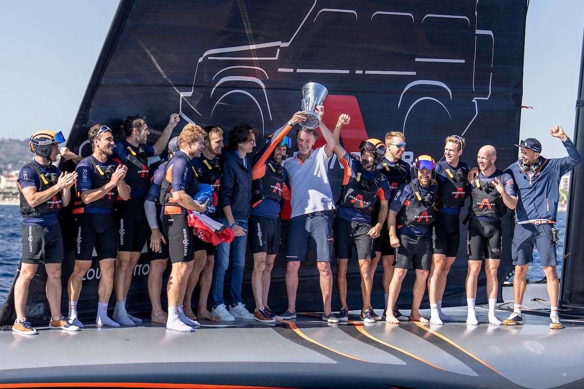 Sir Jim Ratcliffe celebrates with the INEOS team after winning the 2024 Louis Vuitton Cup