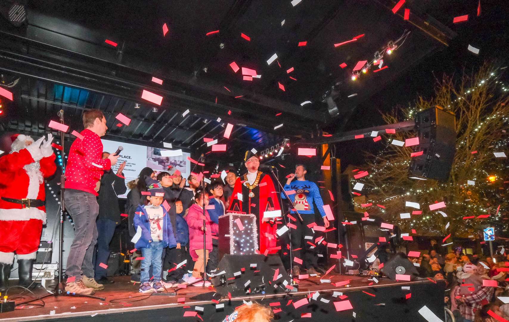 Thatcham mayor John Boyd brought on three local families to switch on the Christmas lights.