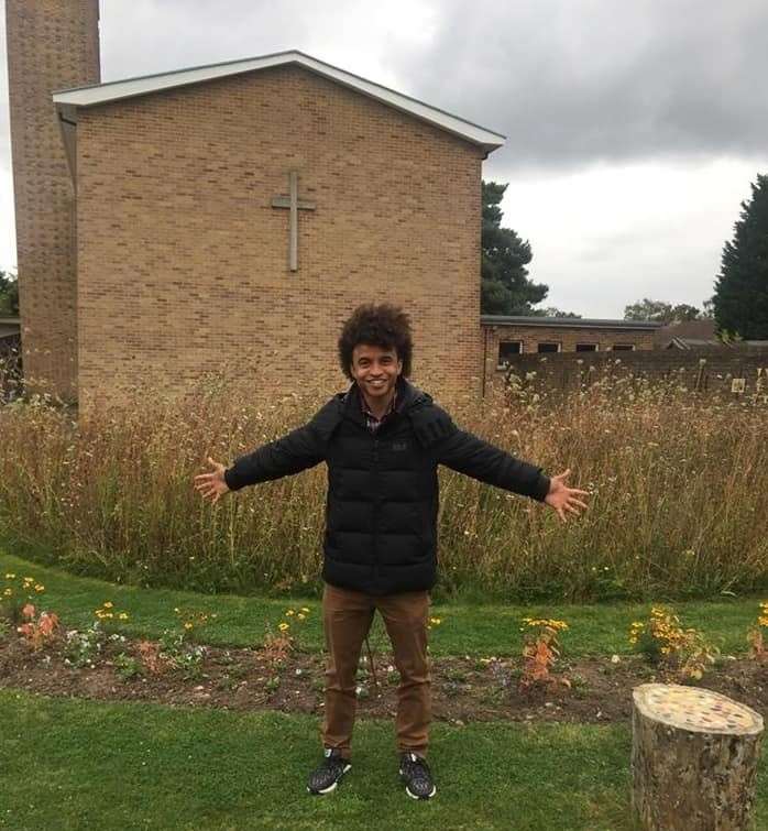 BBC presenter Radzi Chinyanganya in front of the garden (51346257)