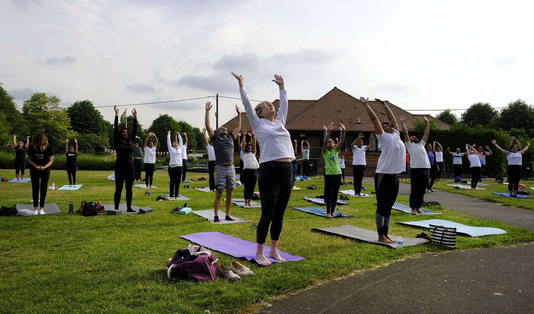 Residents take part in yoga day