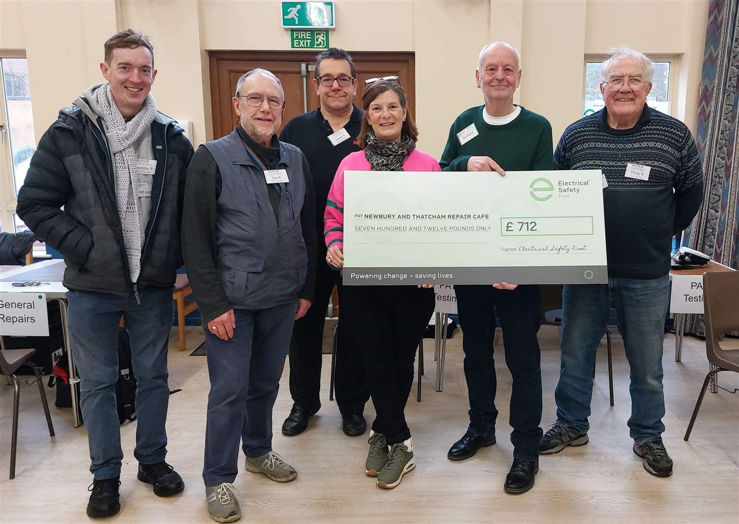 PAT cheque for £712 presented by representatives from the Electrical Safety Fund
