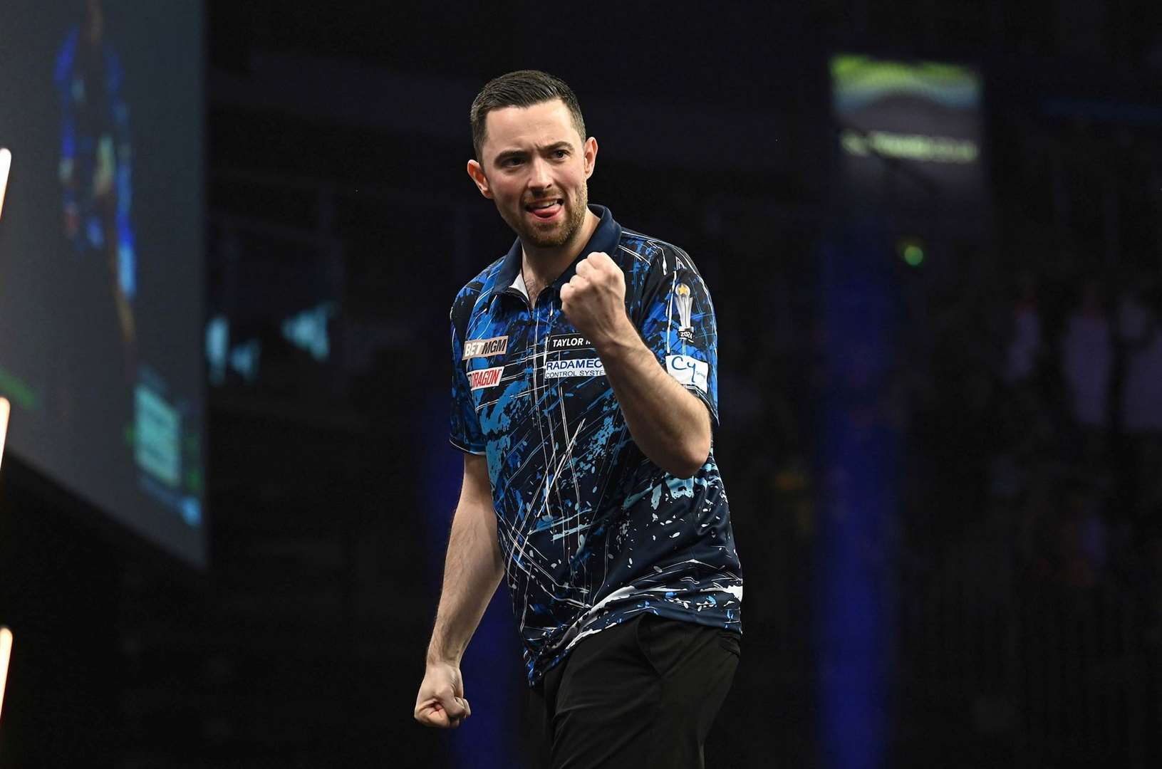 Luke Humphries beat Chris Dobey to make a perfect start to the 2025 Premier League - Photo: Michael Cooper/PDC