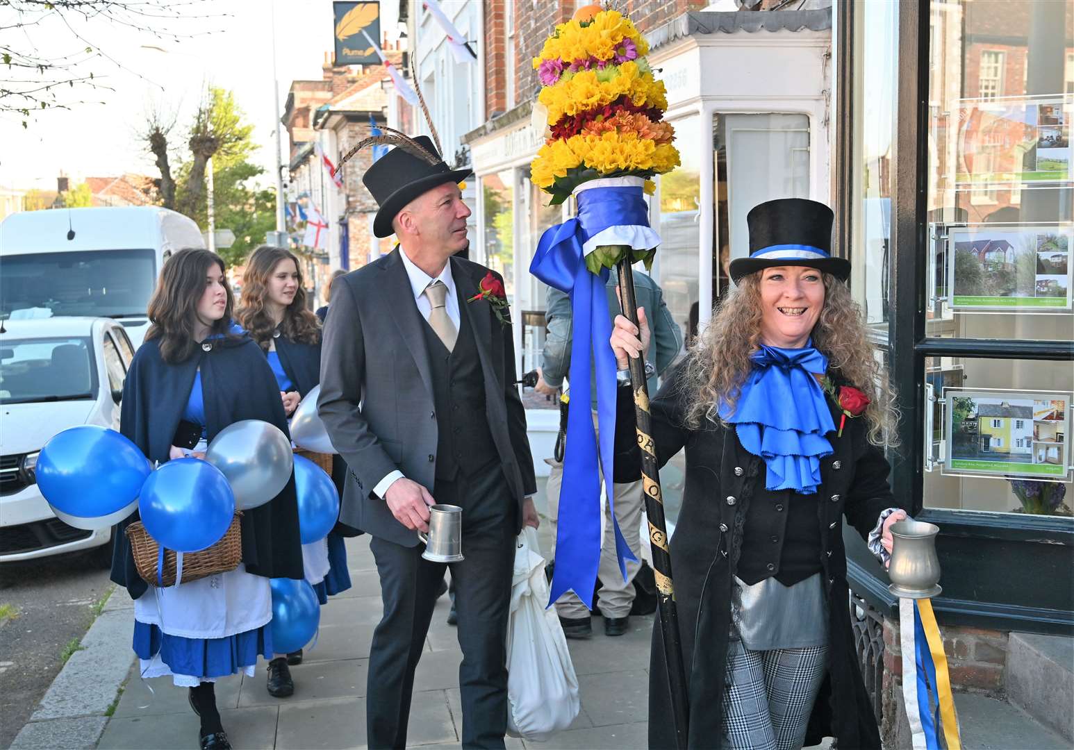 The Tutti parade through town