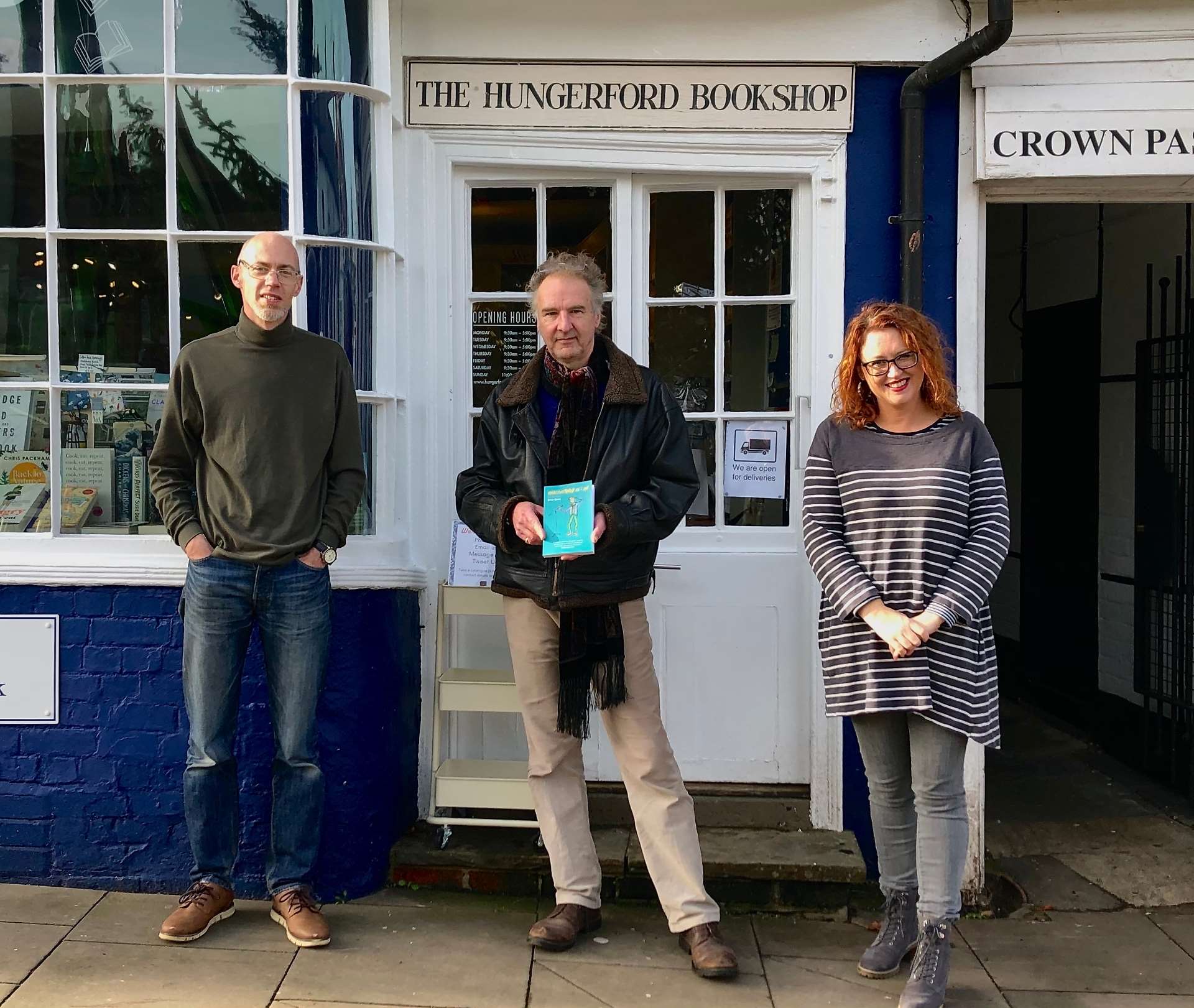 Brian Quinn outside Hungerford Bookshop with owners Alex and Emma Milne-White