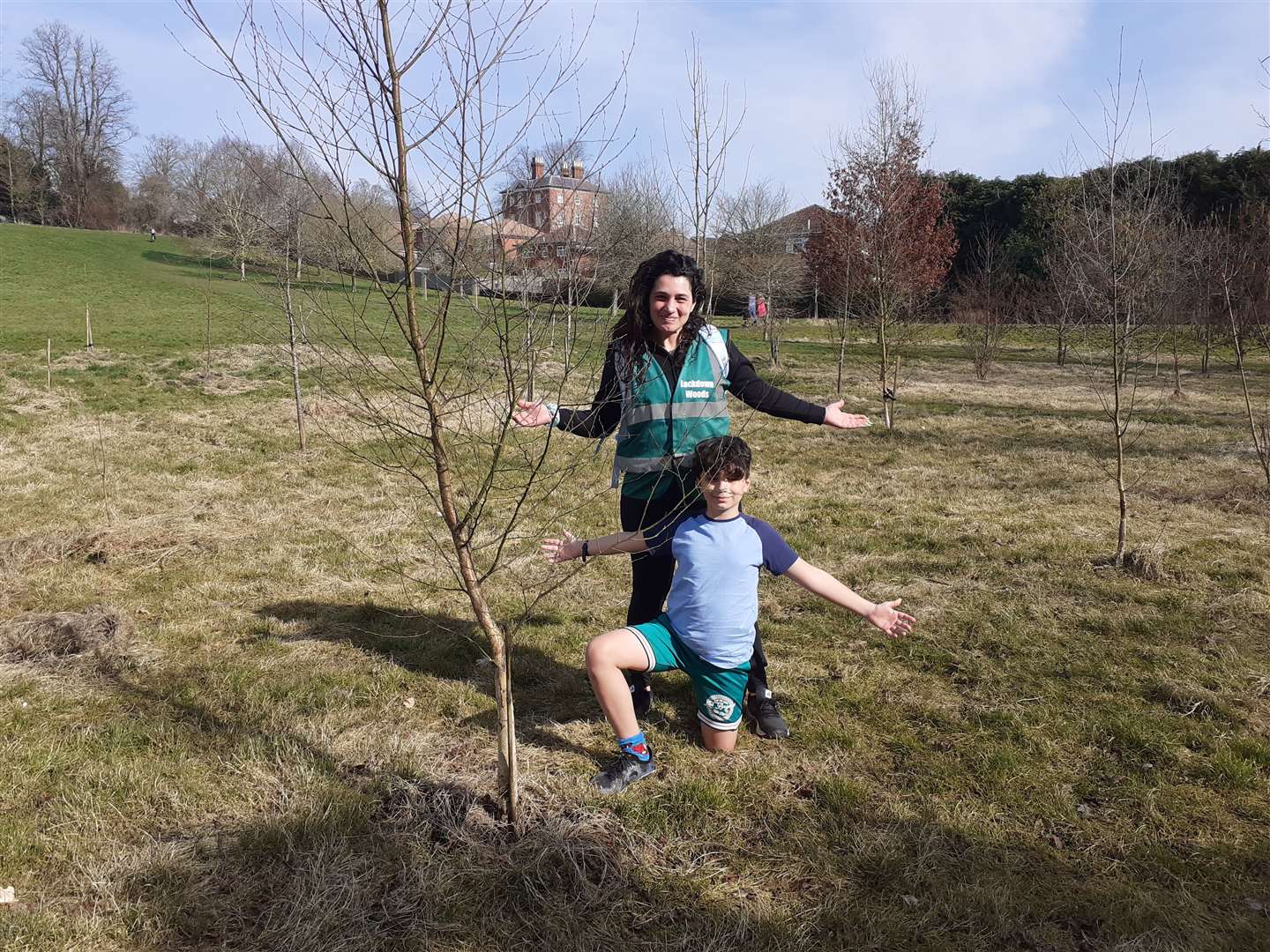 Sara and Nuni Puertas among the trees they planted, in March 2025