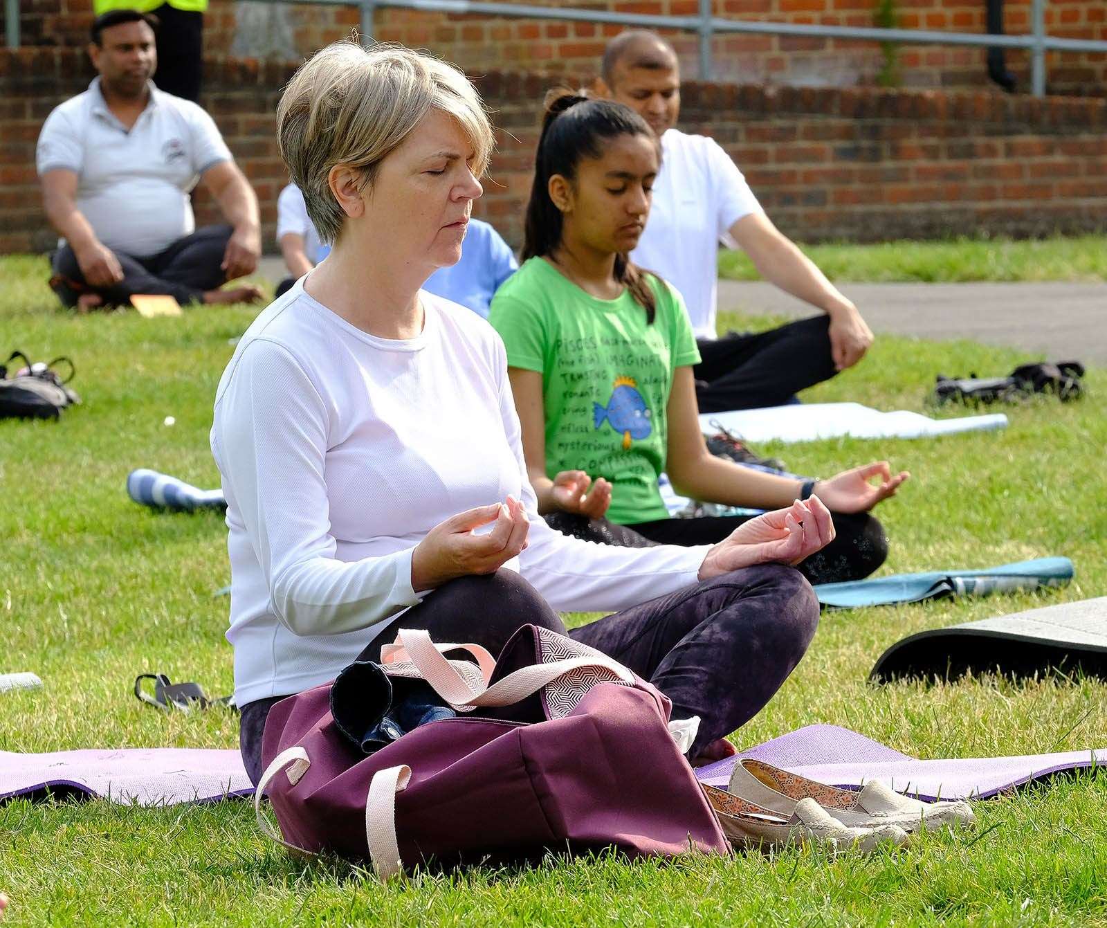 Residents take part in yoga day
