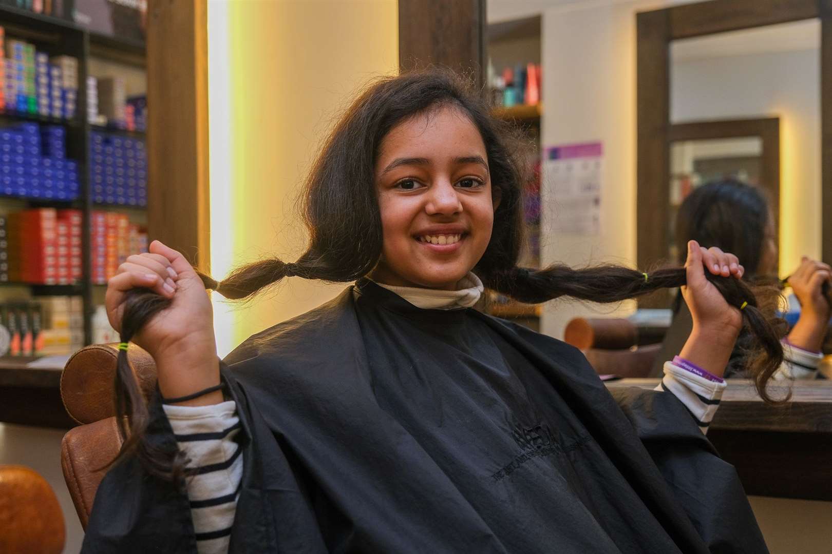Trisha Mehta having her hair cut for little princess charity