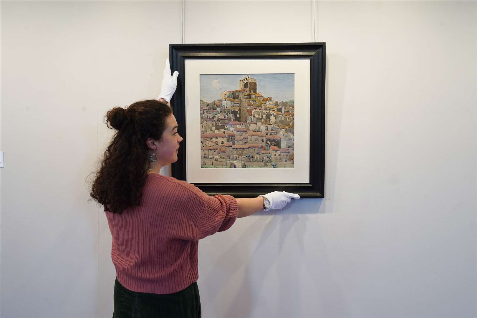 Associate specialist Ursula Goldsmith with the Bouleternere watercolour (Stewart Attwood/Lyon & Turnbull/PA)