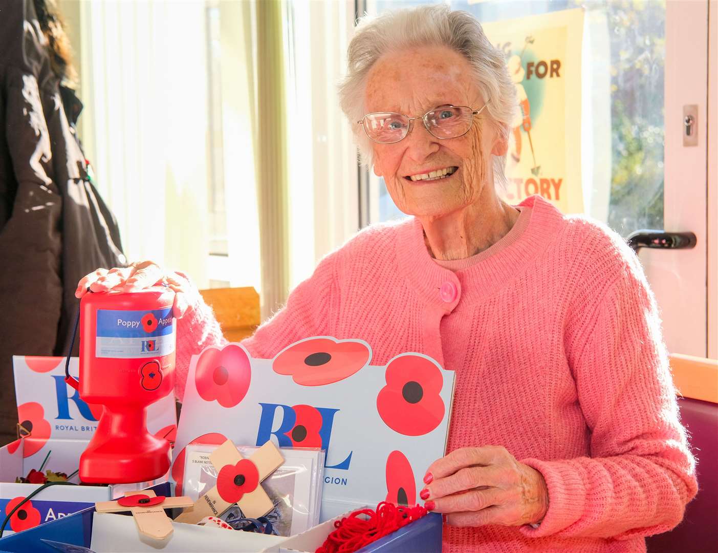 Dot Huntley selling poppies at Willow Edge