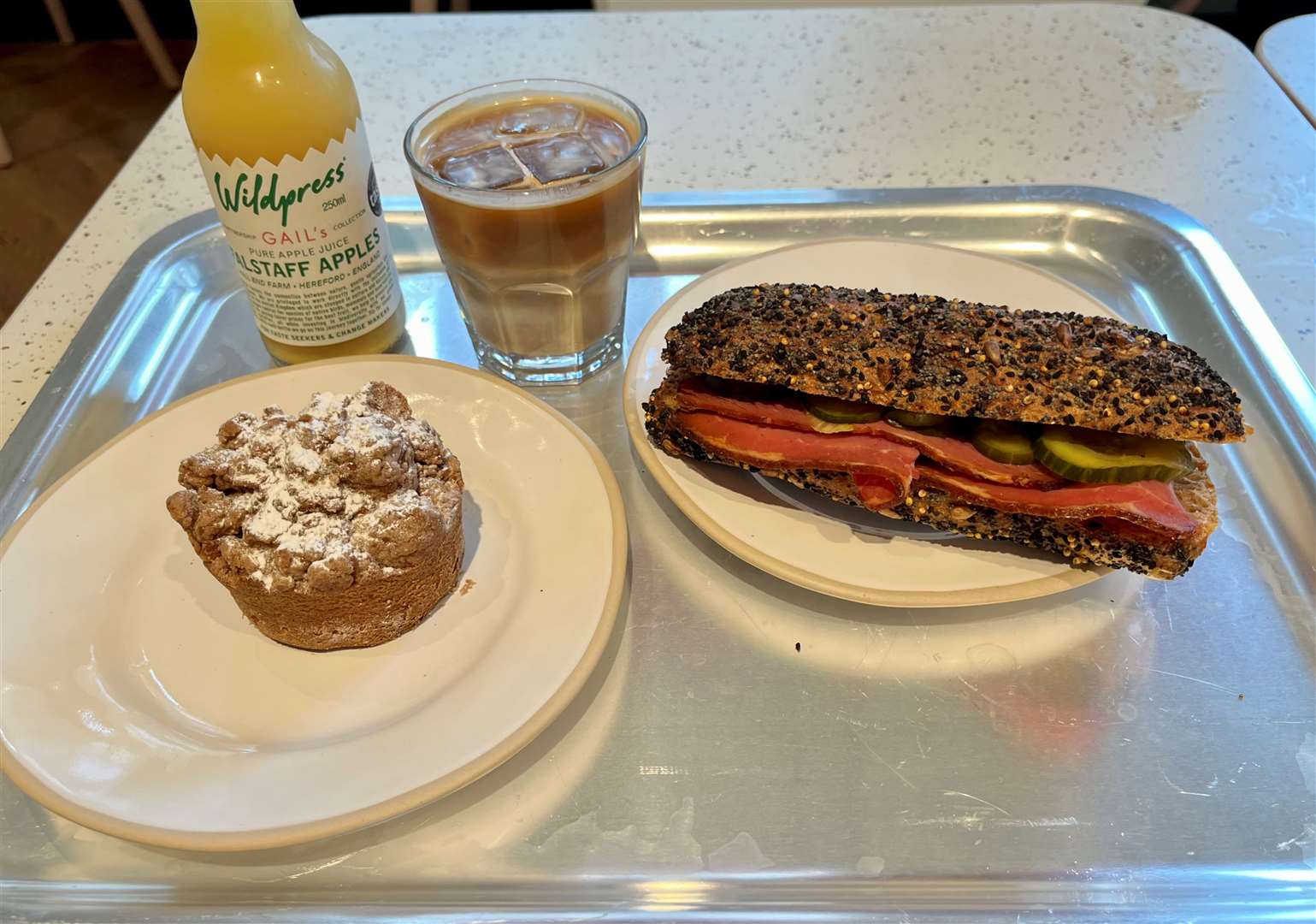 A roll, cake, iced coffee and drink — all for just over £20